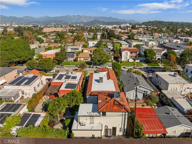 an aerial view of a city with lots of residential buildings