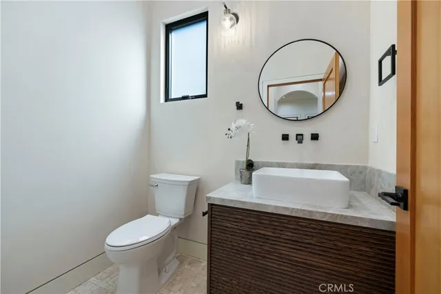 a bathroom with a shower and a toilet
