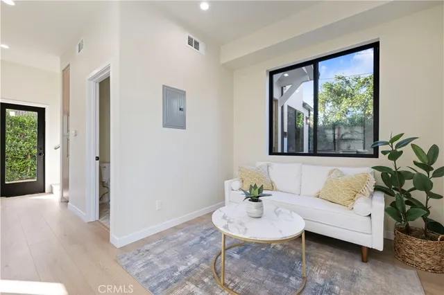 a view of a hallway with washer and dryer