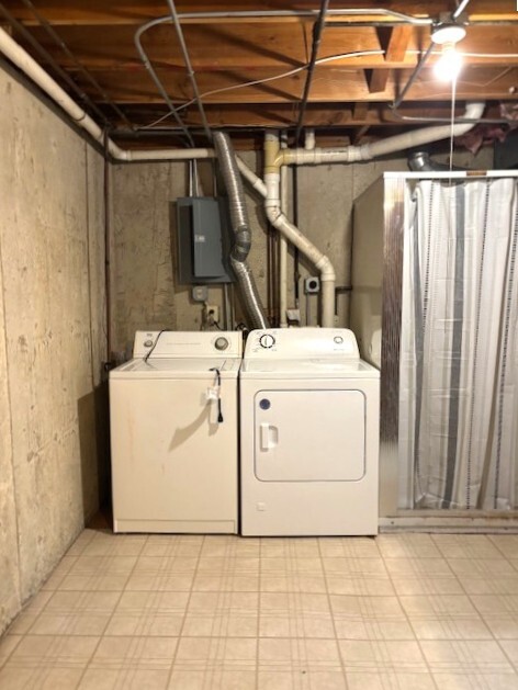 117 Colonial Parkway, Unit A Yorkville, IL 60560 - Photo 12 of 12 a utility room with dryer and washer