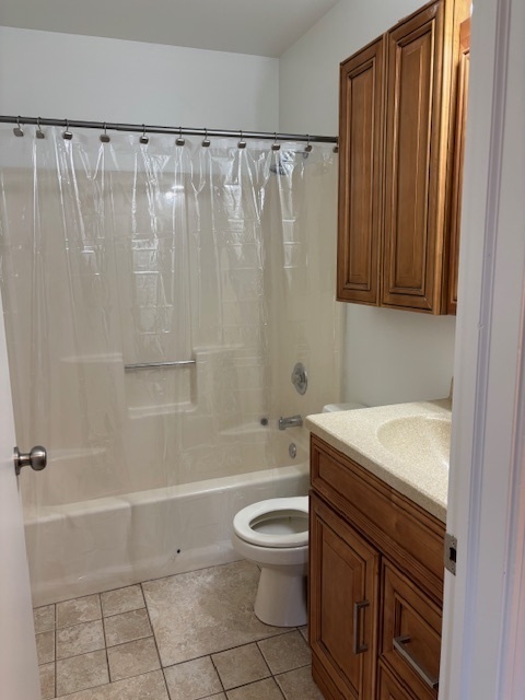 117 Colonial Parkway, Unit A Yorkville, IL 60560 - Photo 6 of 12 a bathroom with a sink a toilet and shower