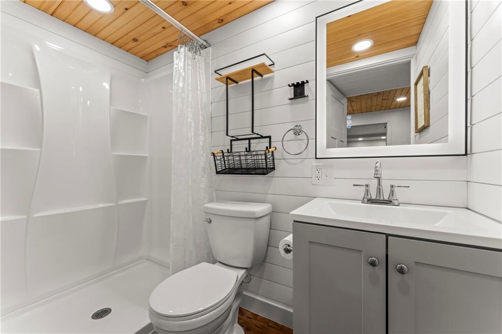 857 East McMurray Road Venetia, PA 15367 - Photo 29 of 37 a bathroom with a toilet sink vanity shower and mirror