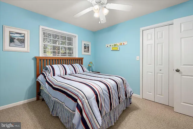 an aerial view of residential building and ocean view