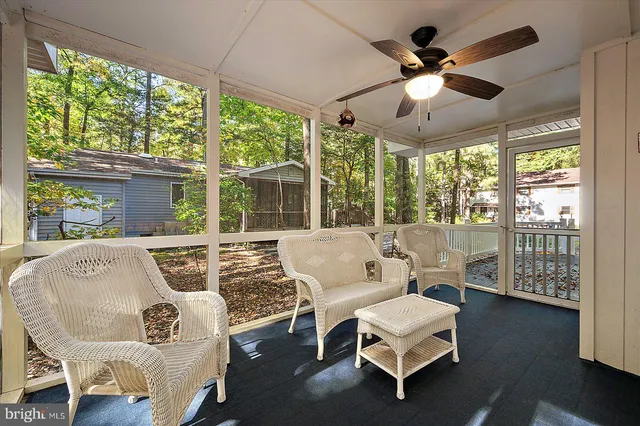 a view of a swimming pool with a yard