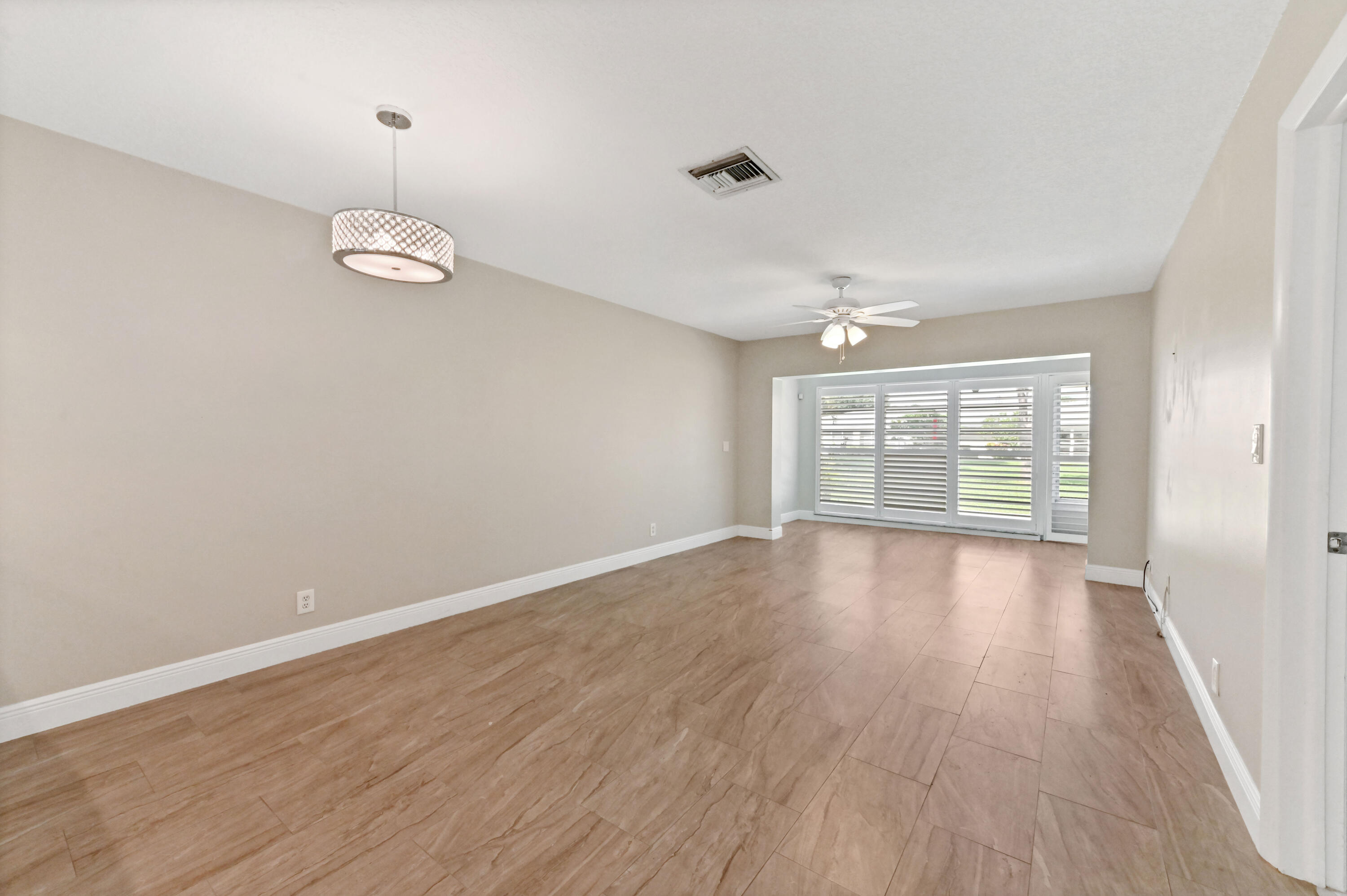 13745 Flora Place, Unit B Delray Beach, FL 33484 - Photo 8 of 28 06 Dining Room 02