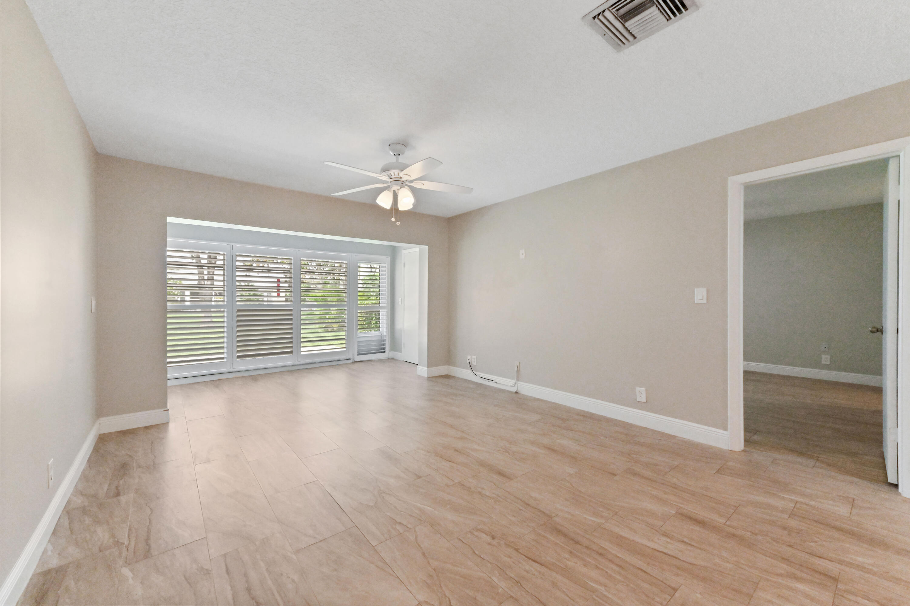 13745 Flora Place, Unit B Delray Beach, FL 33484 - Photo 9 of 28 10 Living Room 01