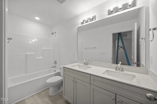 an empty room with closet area