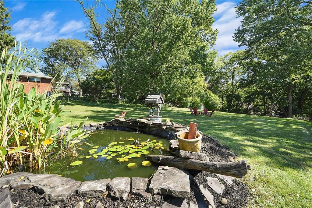 2012 Mohawk Road Pittsburgh, PA 15241 - Photo 21 of 25 a backyard of a house with a yard and outdoor seating
