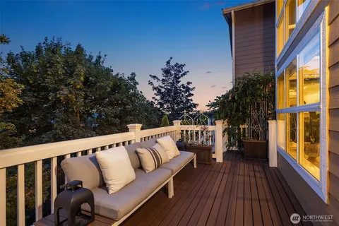 a view of balcony with furniture