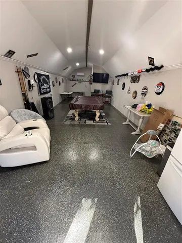 a bathroom with a toilet sink and shower