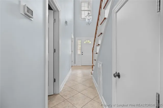 a view of a hallway with a room