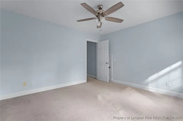 a spacious bathroom with a sink double vanity and a mirror