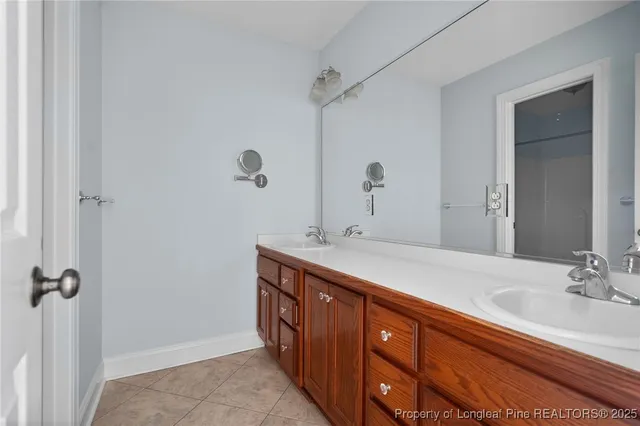 a white toilet sitting next to a bath tub