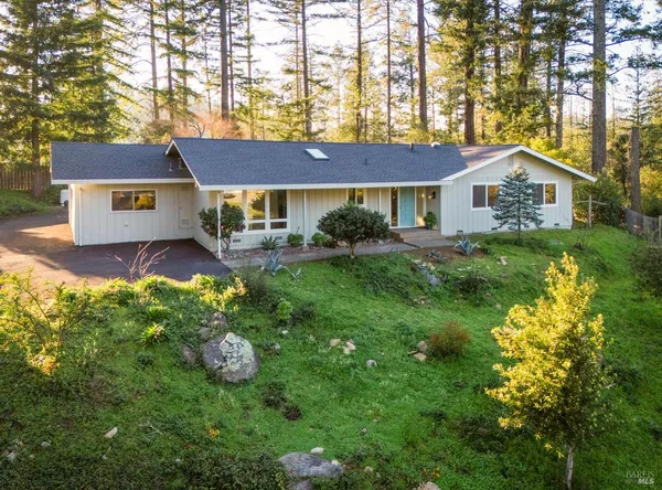 a view of a house with garden