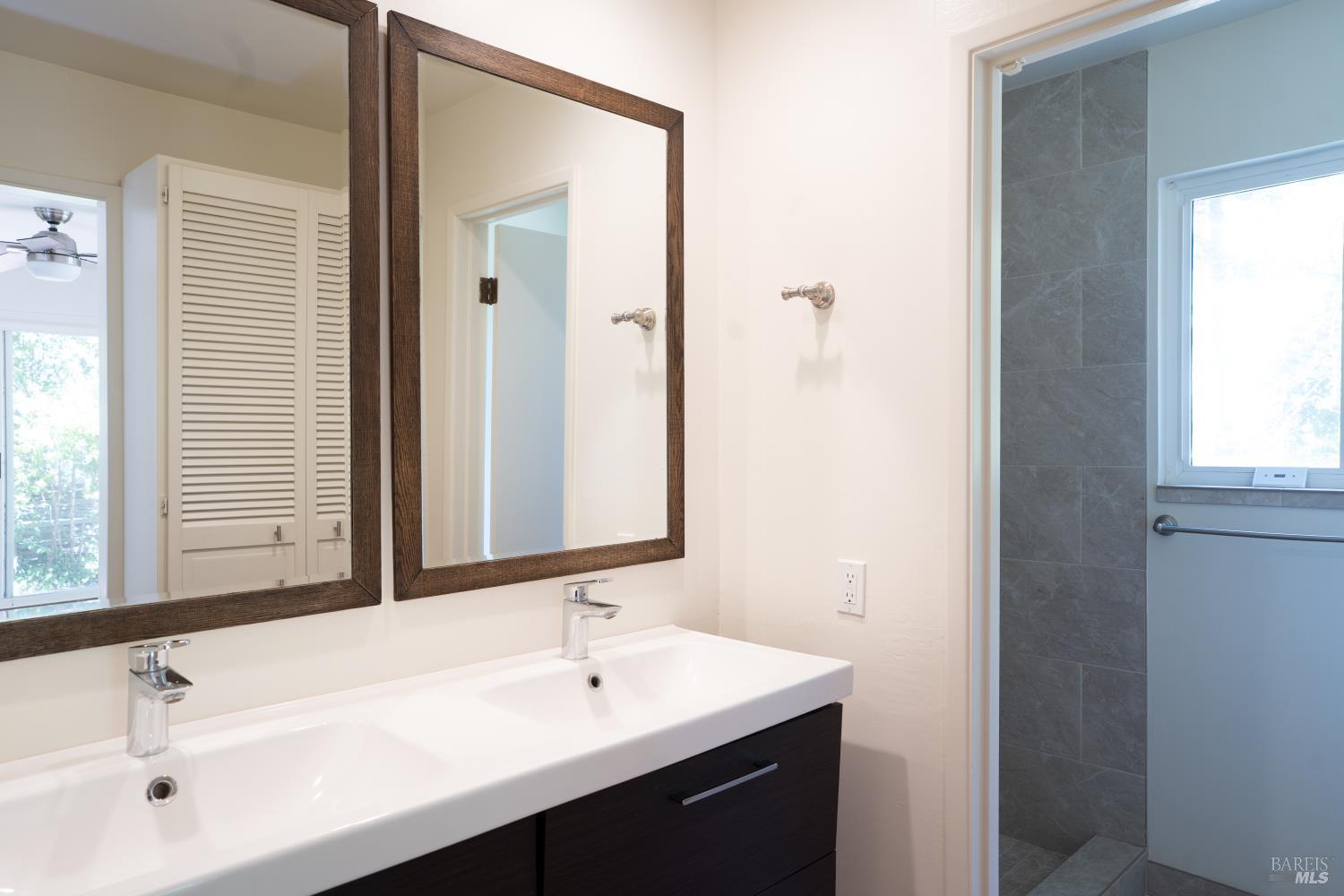 120 Cold Springs Road Angwin, CA 94508 - Photo 20 of 25 a bathroom with a sink and a mirror