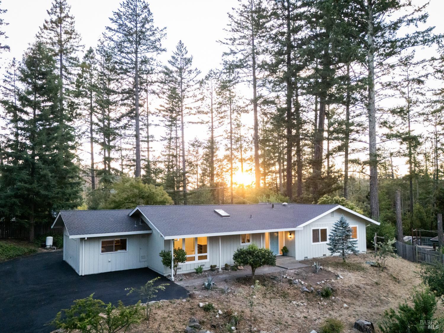 120 Cold Springs Road Angwin, CA 94508 - Photo 21 of 23 a front view of a house with a yard and garage