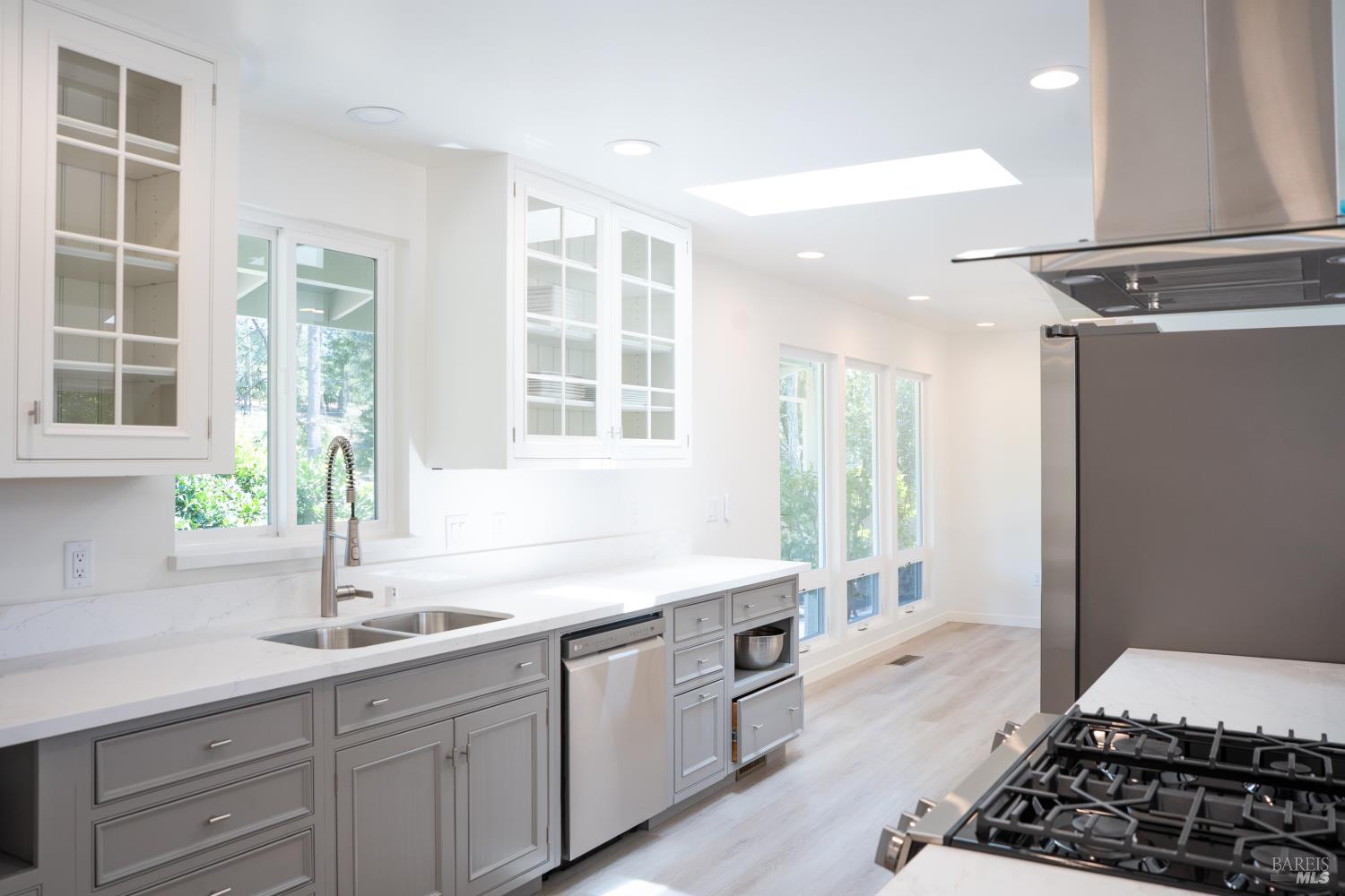 120 Cold Springs Road Angwin, CA 94508 - Photo 3 of 23 a kitchen with a sink stove and cabinets