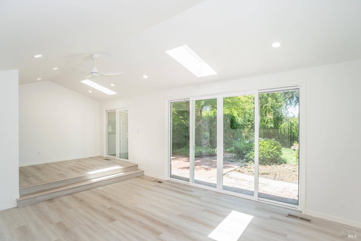 120 Cold Springs Road Angwin, CA 94508 - Photo 6 of 23 a view of an empty room with wooden floor and a window