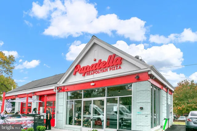 a building with a clock on the wall