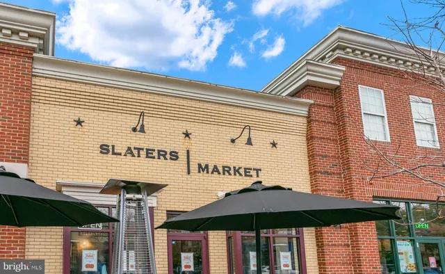 a view of a sign board with a big yard