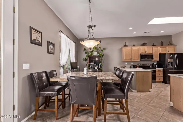 a view of a dining room with furniture