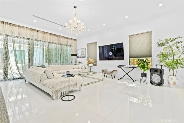 a bathroom with a sink vanity mirror and toilet