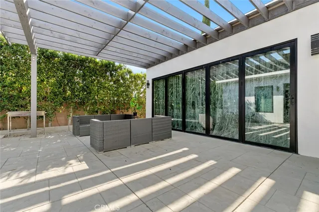 a kitchen with stainless steel appliances granite countertop a stove refrigerator sink and cabinets