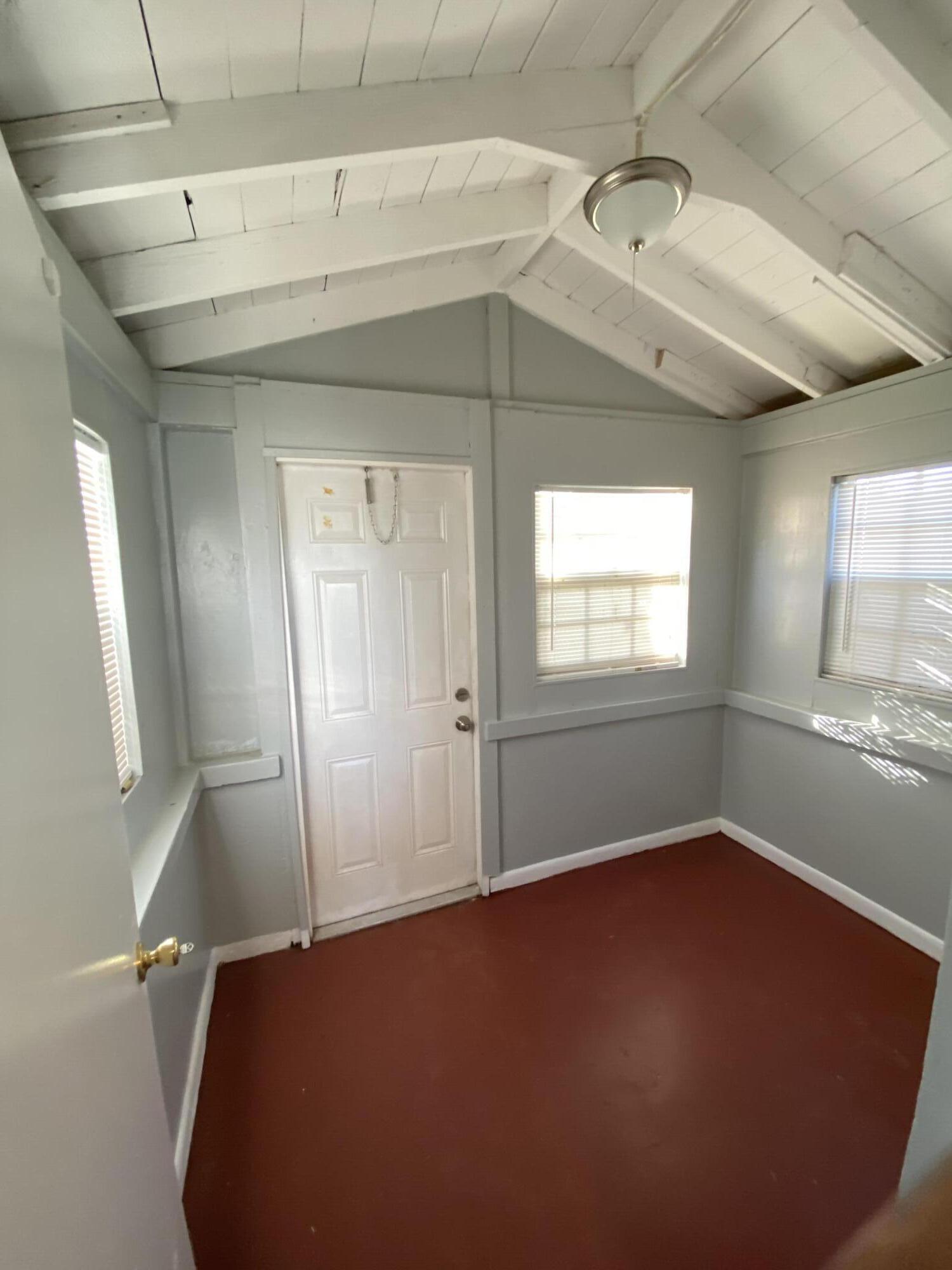 119 West 25th Street, Unit B Riviera Beach, FL 33404 - Photo 6 of 7 a view of empty room with window