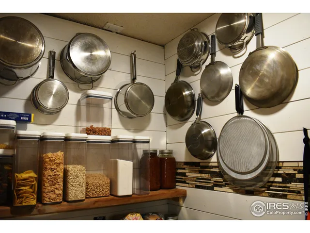 a bed sitting in a room next to a window