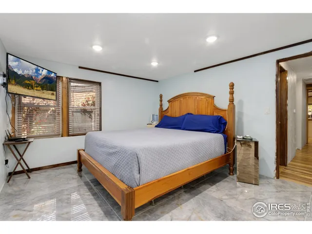 a bathroom with a sink mirror toilet and bathtub