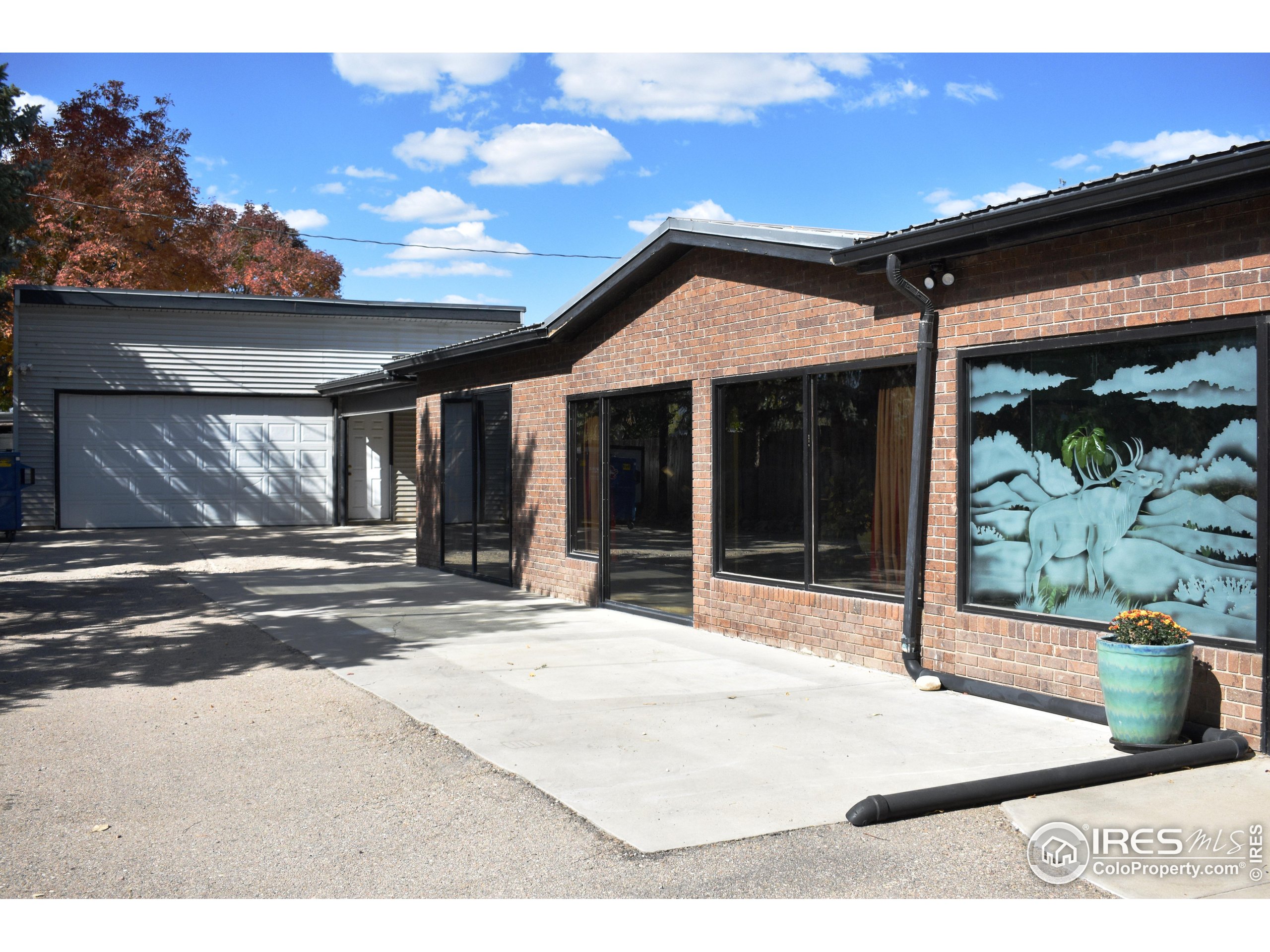 2801 Farview Drive Fort Collins, CO 80524 - Photo 33 of 40 a view of a house with a patio
