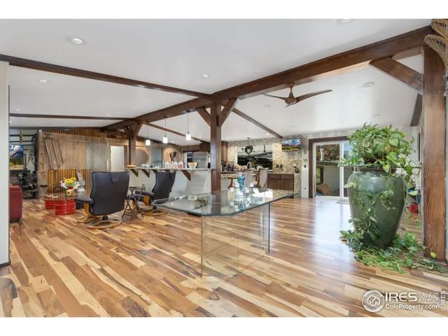 a view of a livingroom with furniture and window
