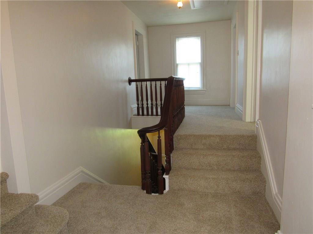 414 Monroe Road Sarver, PA 16055 - Photo 14 of 24 New carpet and paint are featured throughout the second level. This is a view of the unique landing leading to the bedrooms.