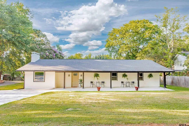 a view of a house with a swimming pool
