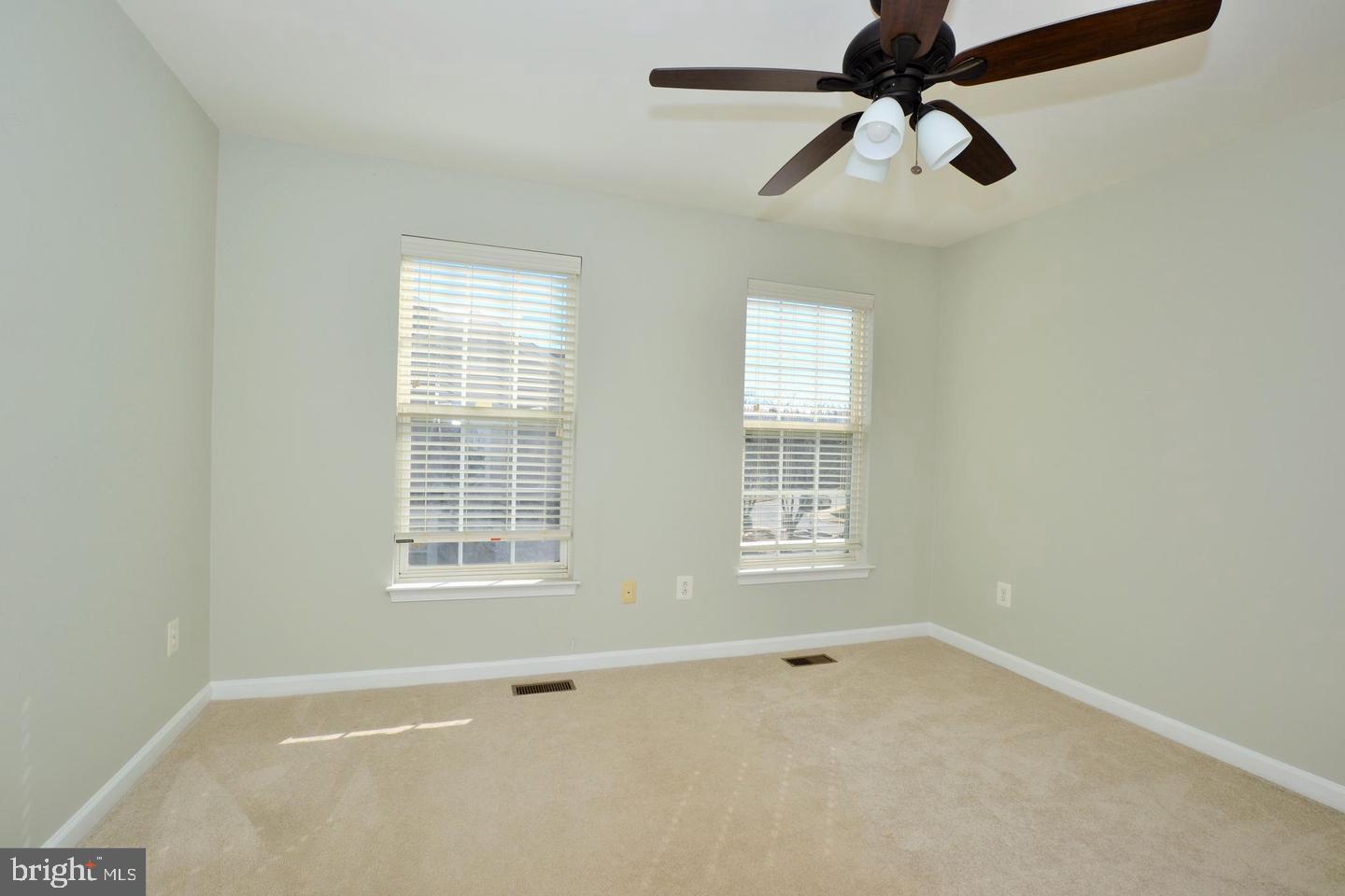 43048 Zander Terrace Ashburn, VA 20147 - Photo 13 of 18 a view of an empty room with a window