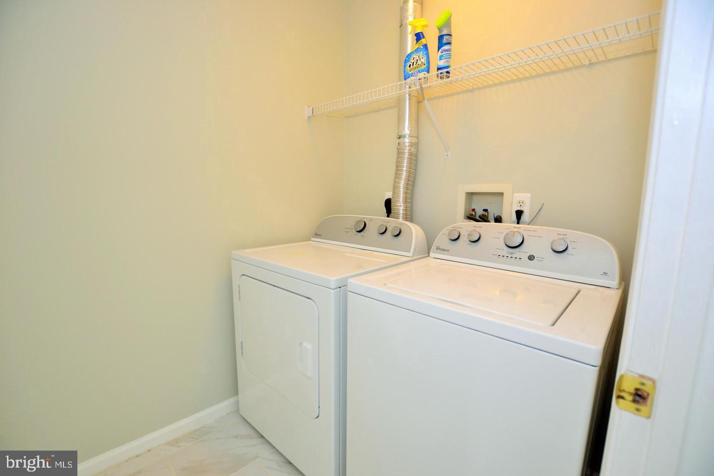 43048 Zander Terrace Ashburn, VA 20147 - Photo 16 of 18 a utility room with dryer and washer