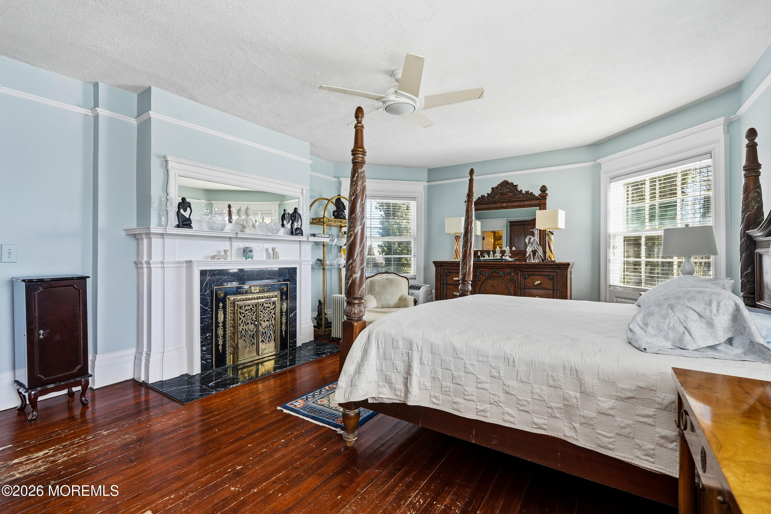 3 Elberon Square Long Branch, NJ 07740 - Photo 14 of 22 a bedroom with a bed and a fireplace