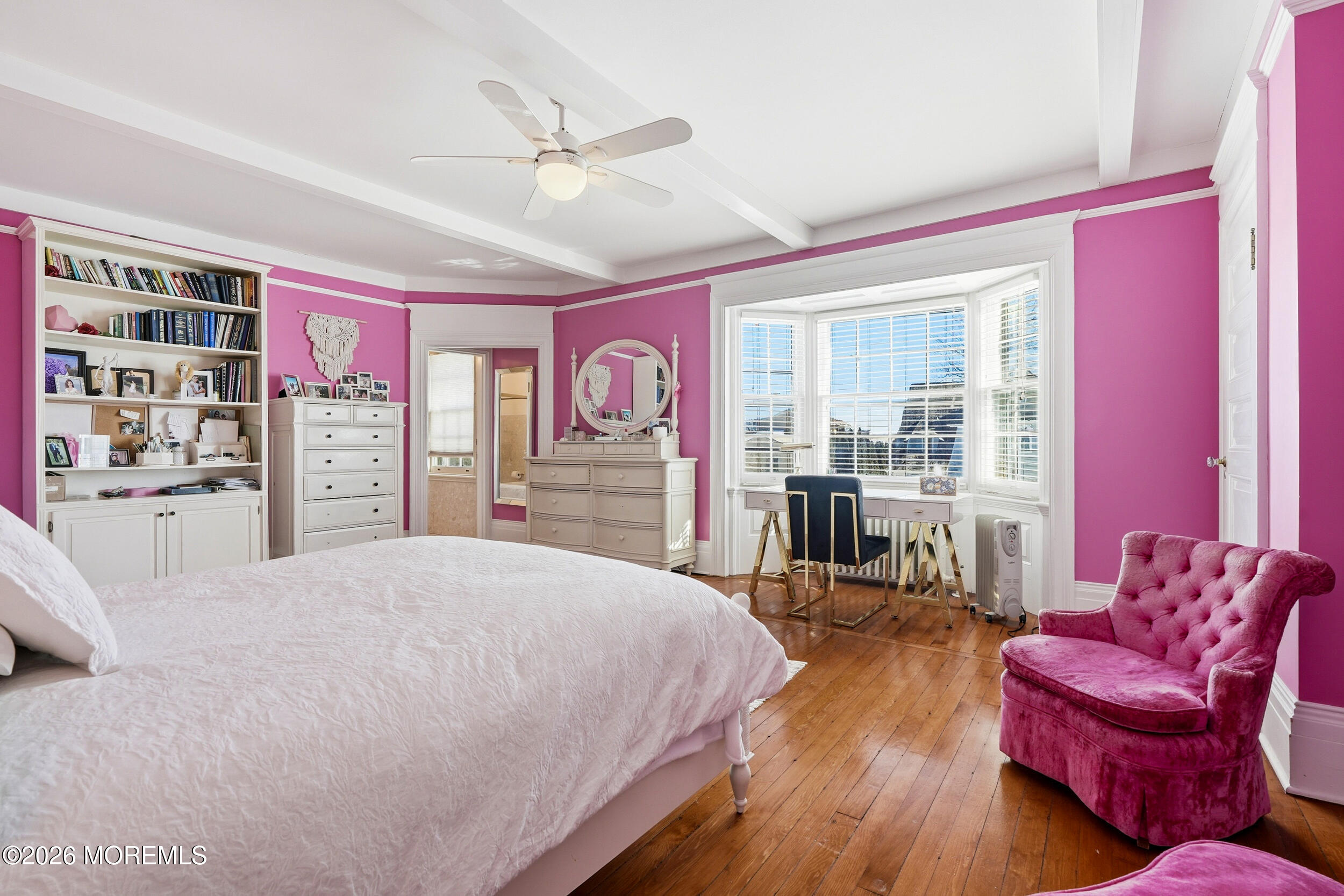3 Elberon Square Long Branch, NJ 07740 - Photo 17 of 22 a spacious bedroom with a bed and a couch