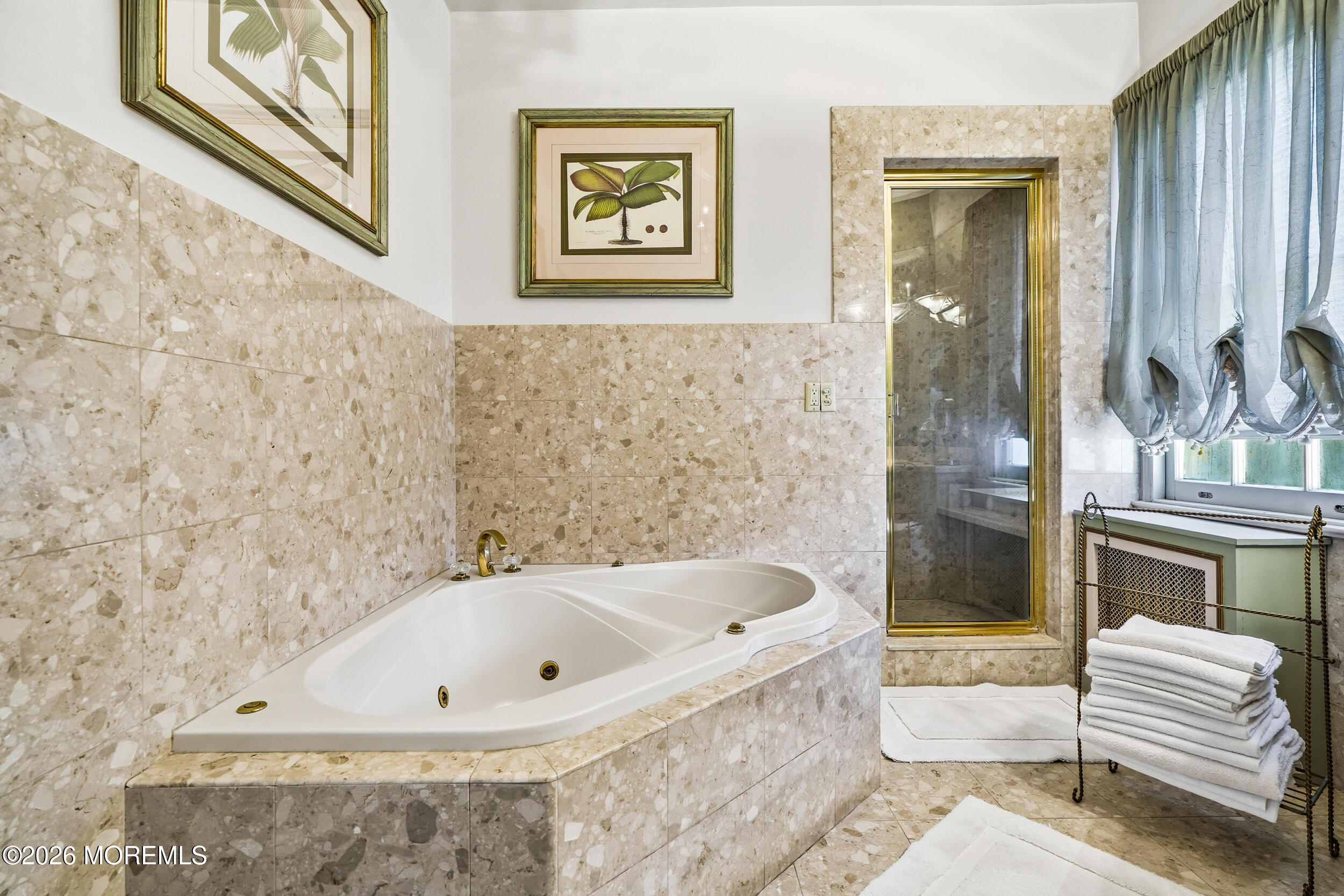 3 Elberon Square Long Branch, NJ 07740 - Photo 18 of 22 a bathroom with a bathtub and a shower