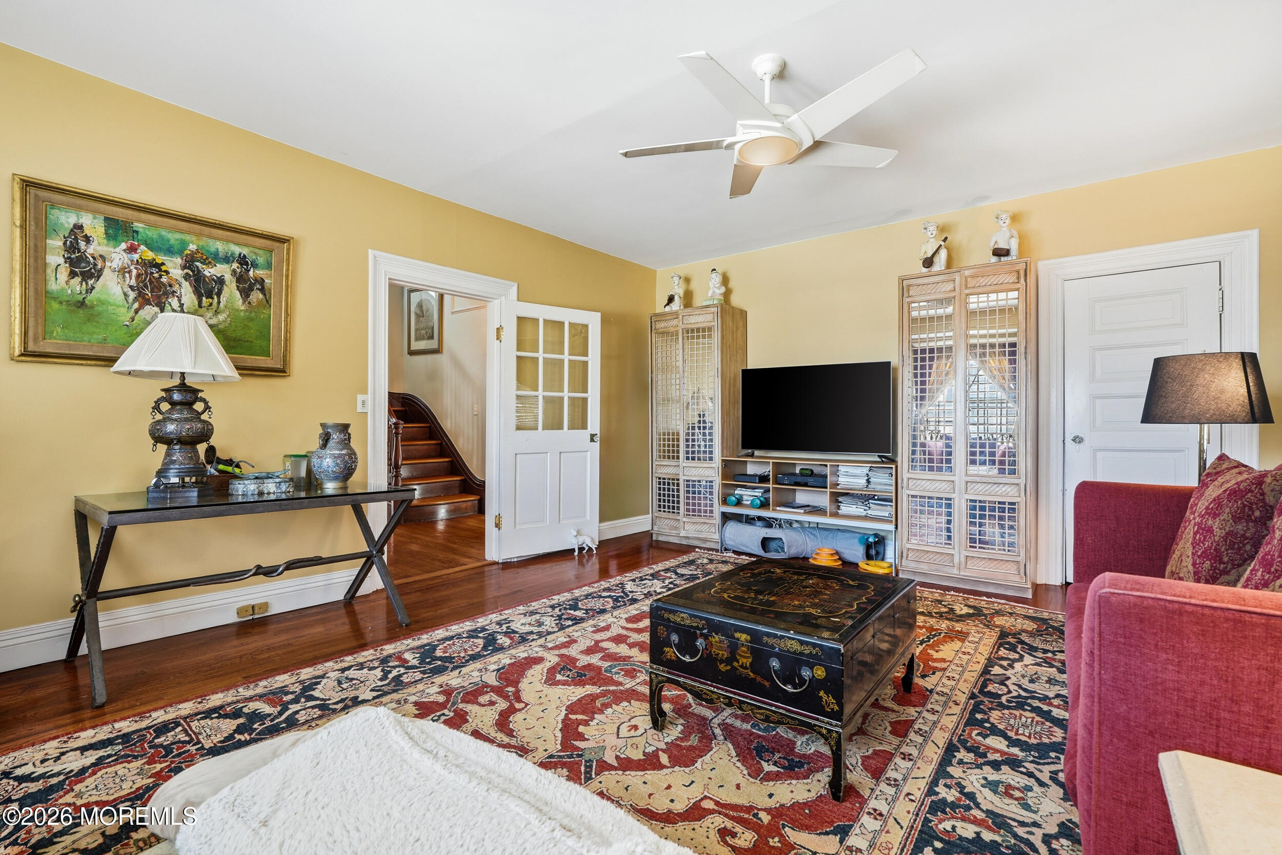 3 Elberon Square Long Branch, NJ 07740 - Photo 21 of 22 a living room with furniture and a flat screen tv
