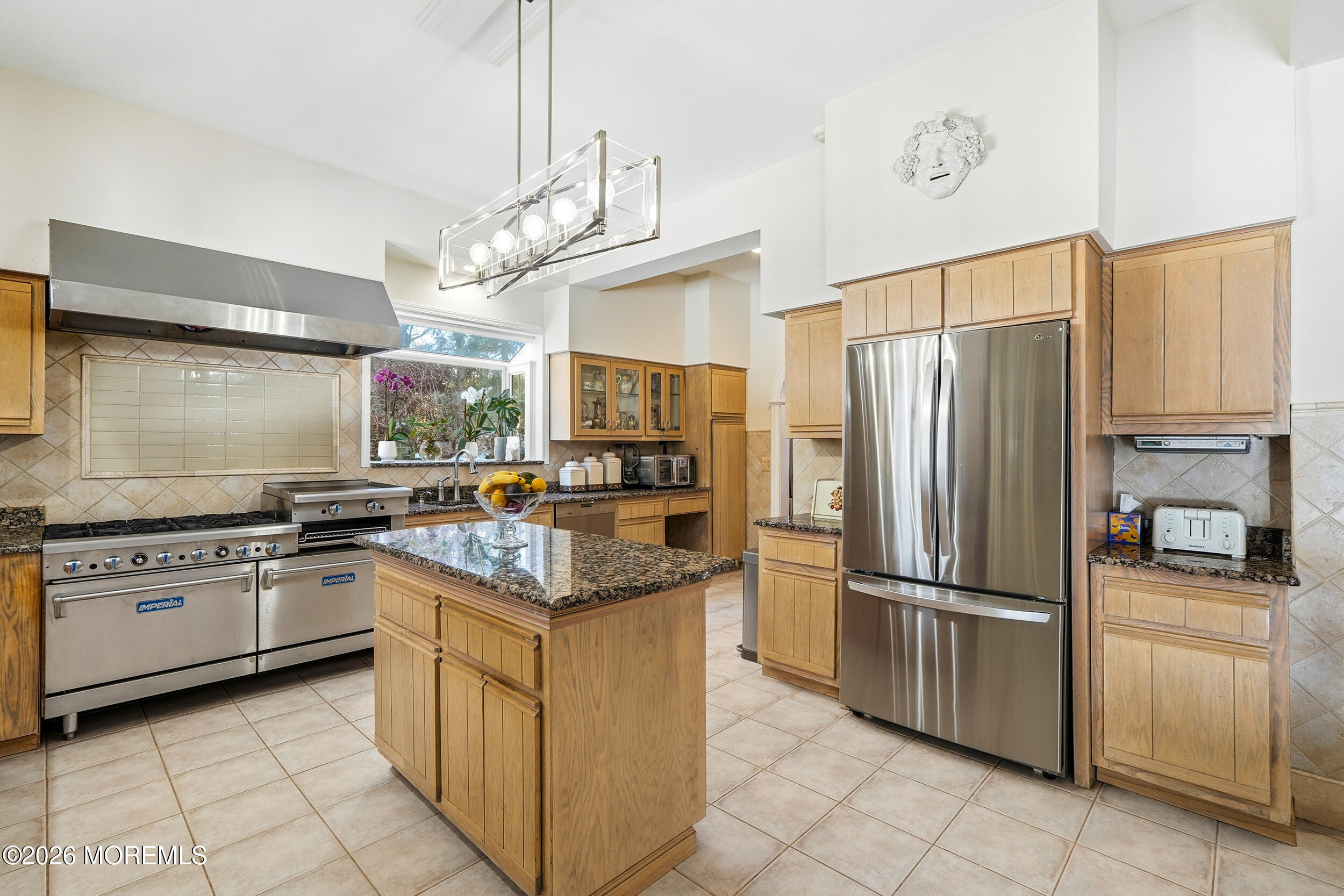 3 Elberon Square Long Branch, NJ 07740 - Photo 10 of 22 a kitchen with white cabinets and stainless steel appliances