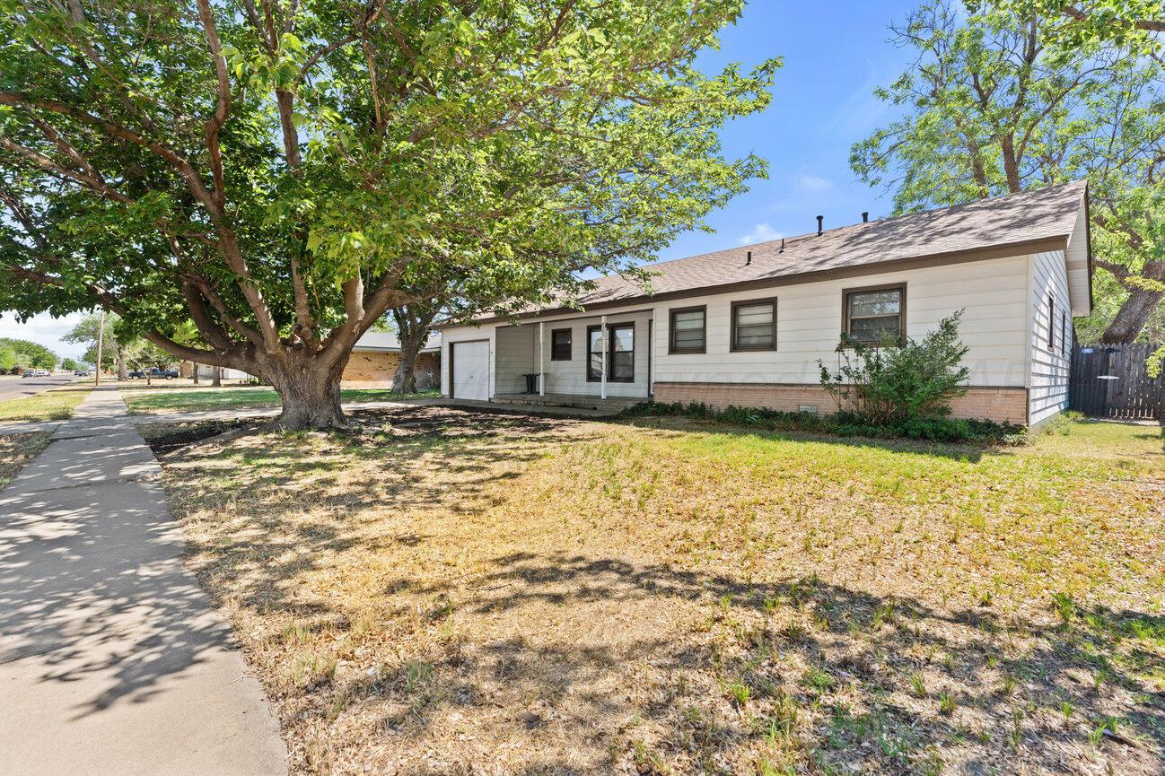 4305 South Bonham Street Amarillo, TX 79110 - Photo 3 of 48 a house view with a garden space