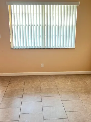 a view of a room with a sink and a window