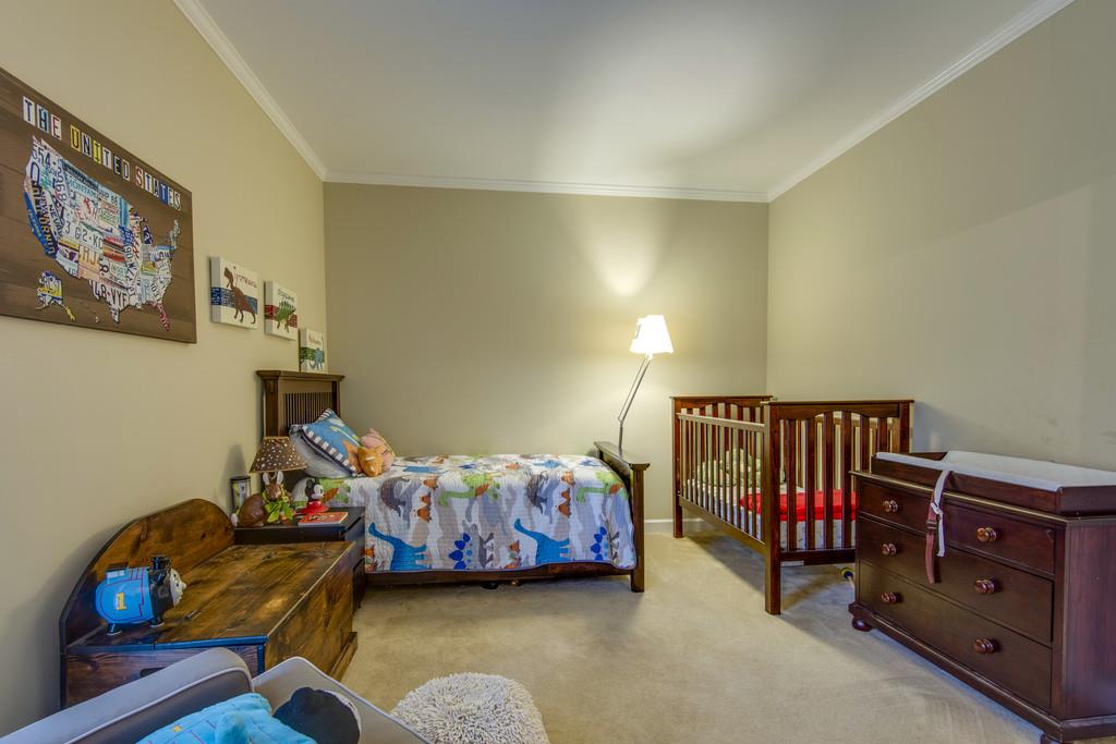 3600 Hobbs Road Nashville, TN 37215 - Photo 20 of 29 a bedroom with a bed and wooden floor