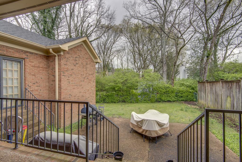 3600 Hobbs Road Nashville, TN 37215 - Photo 27 of 29 a view of a roof deck with couches and wooden fence