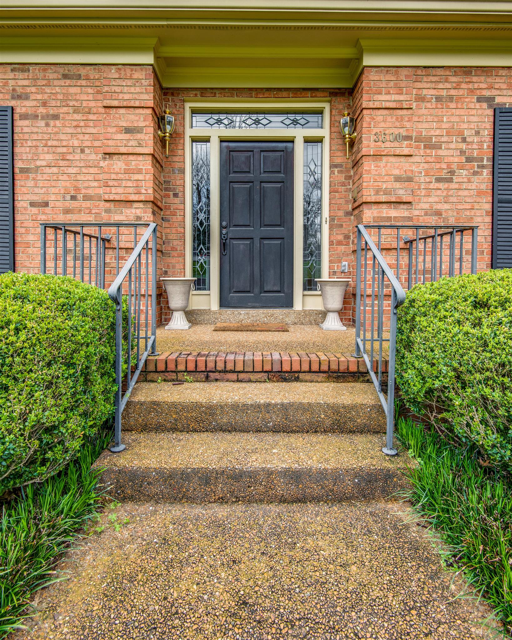 3600 Hobbs Road Nashville, TN 37215 - Photo 3 of 29 a front view of a house with a garden