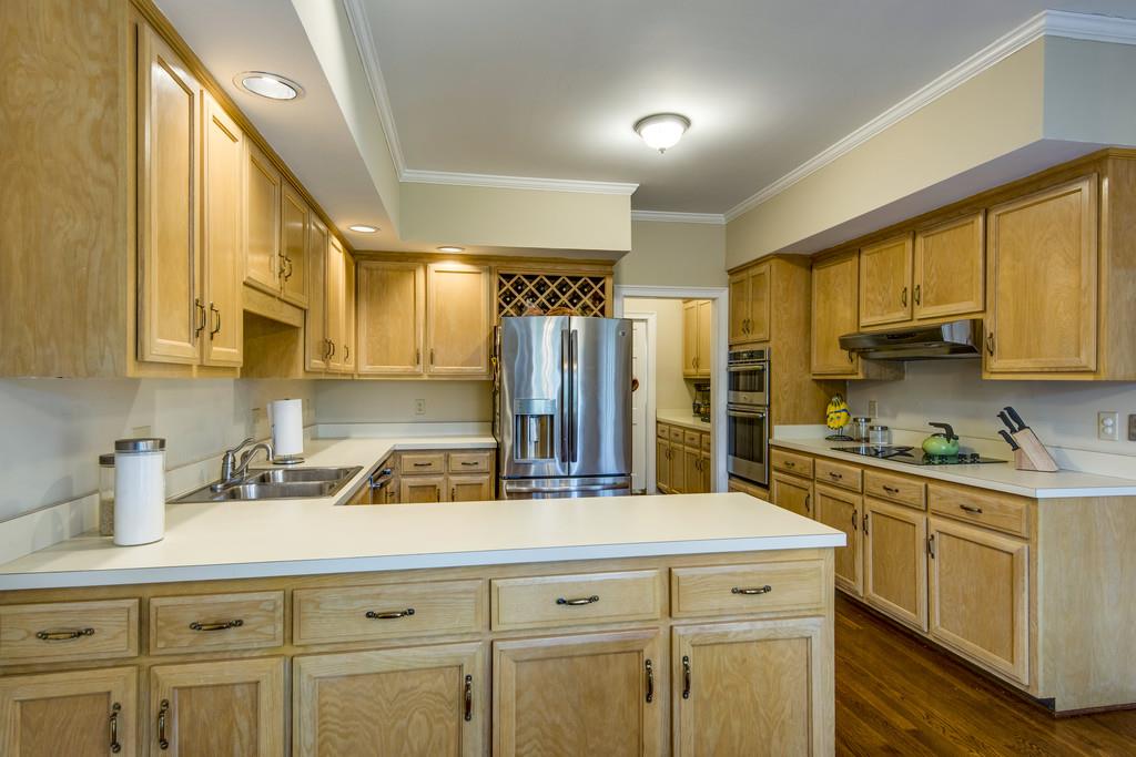 3600 Hobbs Road Nashville, TN 37215 - Photo 8 of 29 a kitchen with stainless steel appliances granite countertop a sink a stove and cabinets