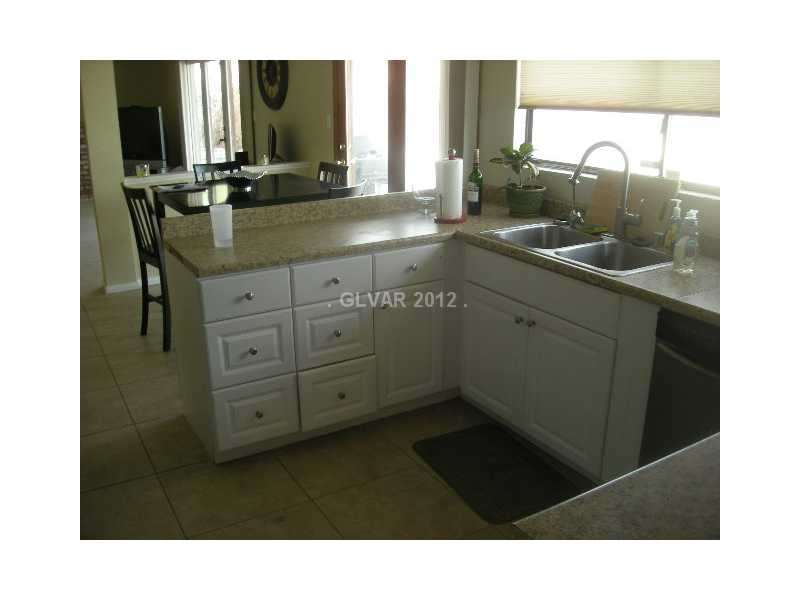 1802 Nuevo Road Henderson, NV 89014 - Photo 3 of 12 Kitchen. UPGRADED CABINETS, WITH BRUSHED NICKEL HARDWARE