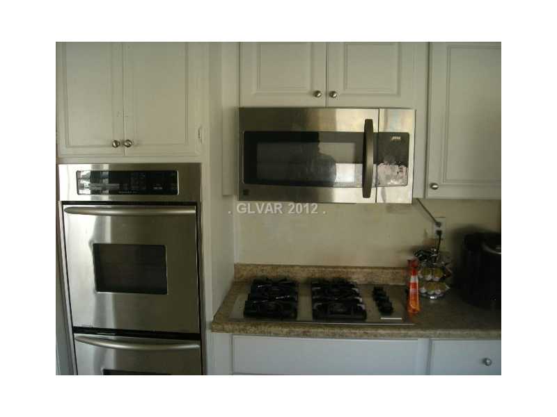 1802 Nuevo Road Henderson, NV 89014 - Photo 4 of 12 Kitchen. STAINLESS STEEL DOUBLE OVENS WITH UPGRADED STOVETOP BURNERS