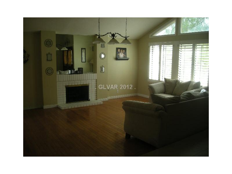 1802 Nuevo Road Henderson, NV 89014 - Photo 6 of 12 Living Room. WOOD LIKE FLOORING